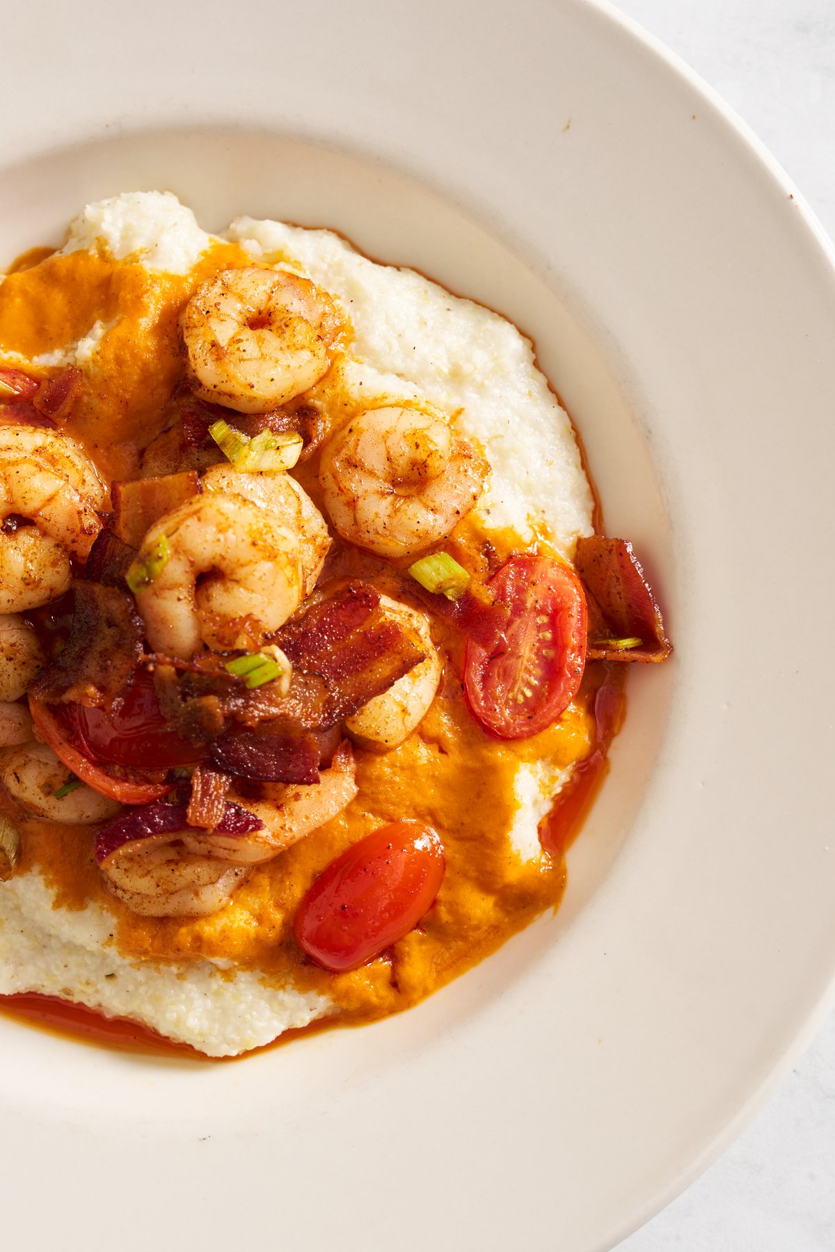 Cajun shrimp sautéed over stone-ground grits